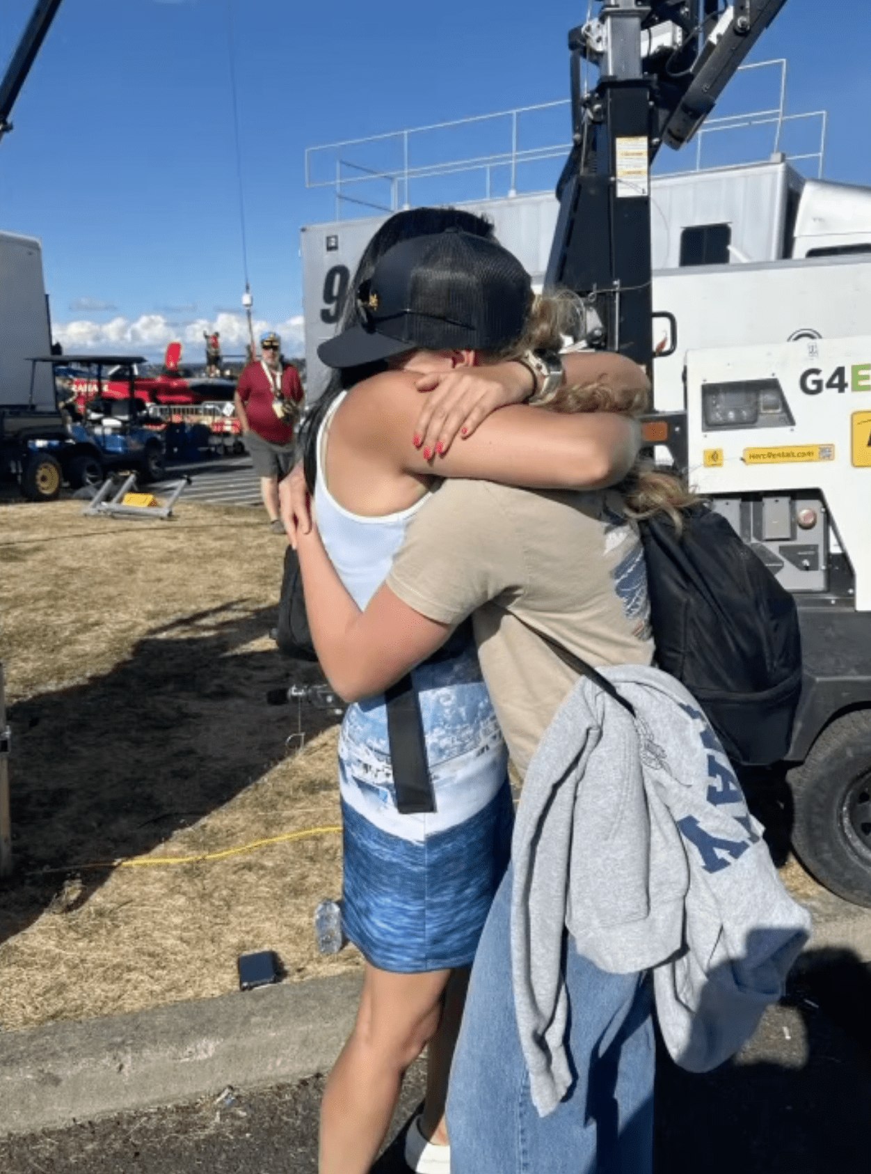 Lillie Vehling hugging Seafair president Emily Cantrell